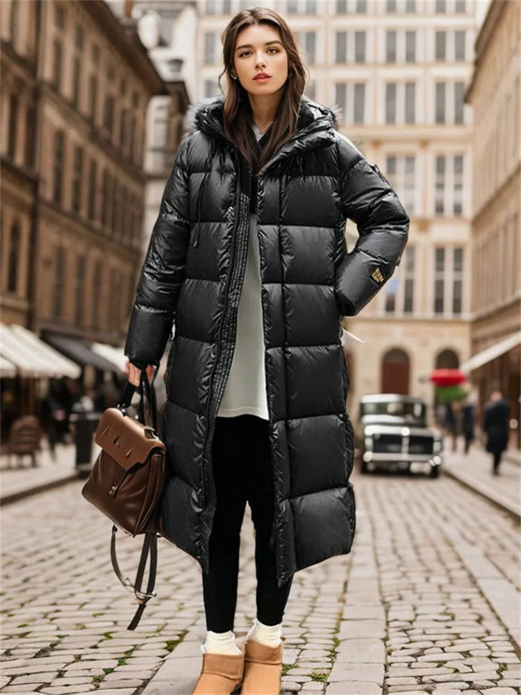 Woman wearing a black puffer coat on a city street