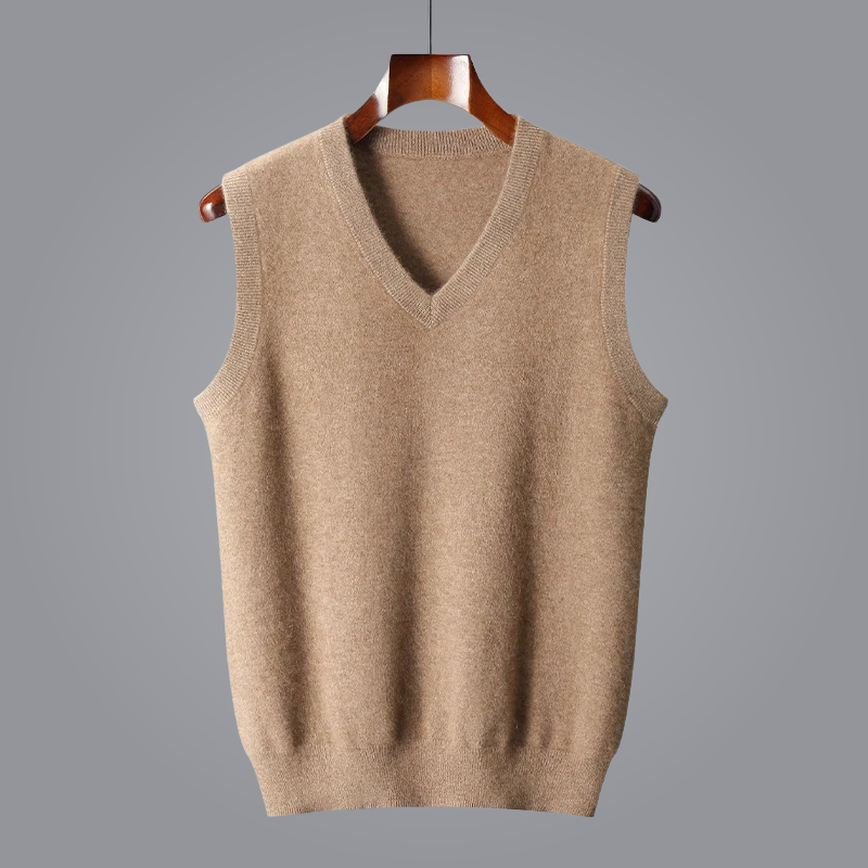 Beige sweater vest on a wooden hanger against a gray background