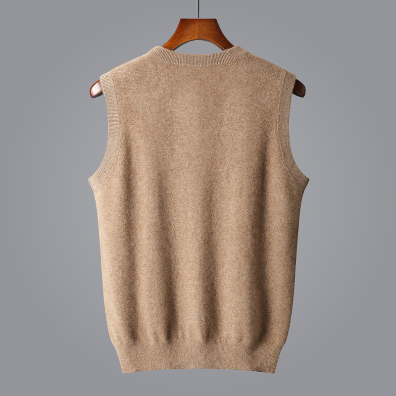 Beige sweater vest on a wooden hanger against a gray background