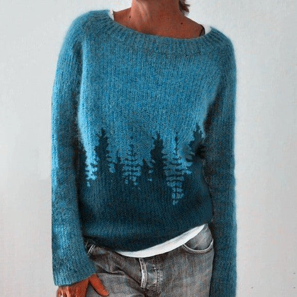 Person wearing a blue sweater with a white background