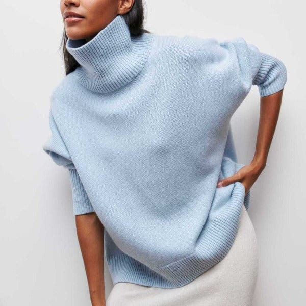 Light blue turtleneck sweater worn by a person on a plain background