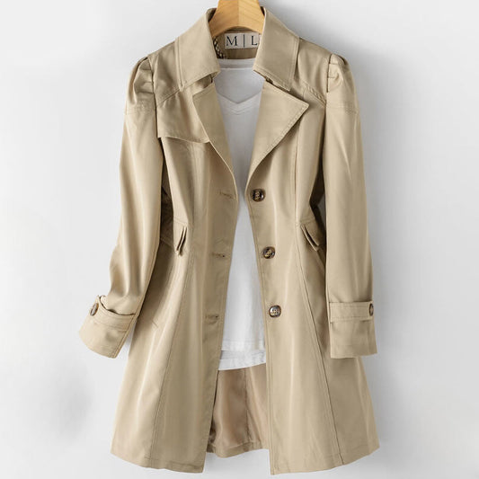 Beige trench coat on a white background