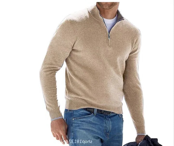 Beige sweater with a zipper worn by a person on a white background