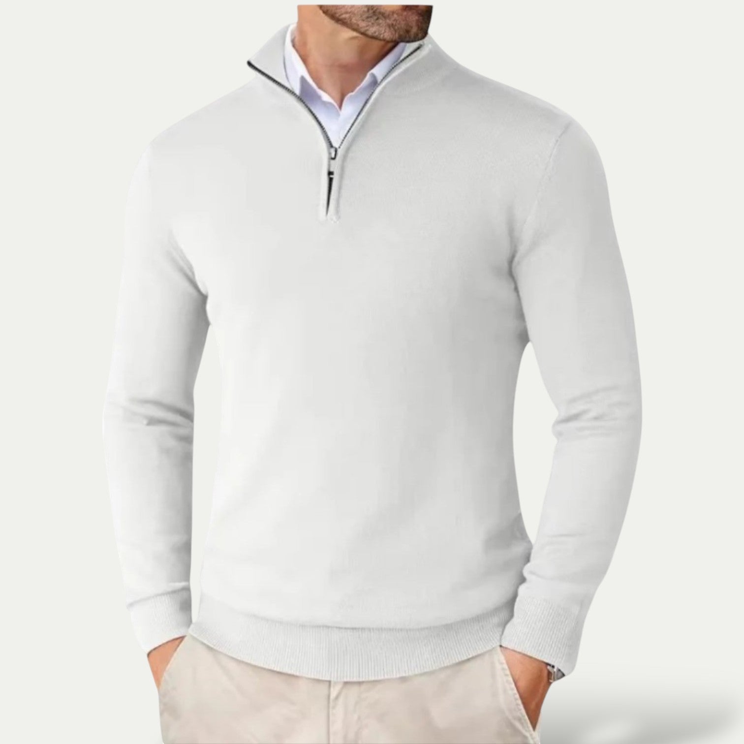 Light gray quarter-zip sweater worn by a person on a white background
