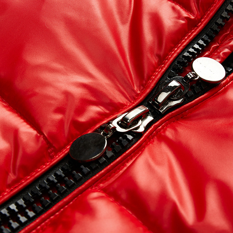 Close-up of a red jacket with a zipper