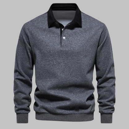 Gray sweater with black collar on a gray background