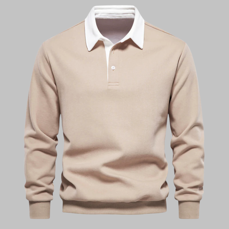 Beige sweater with white collar on a gray background