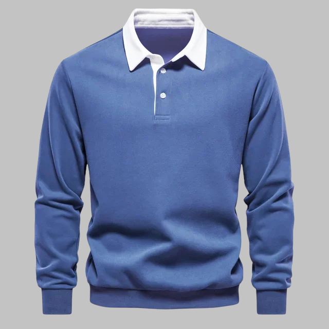 Blue sweater with white collar on a gray background