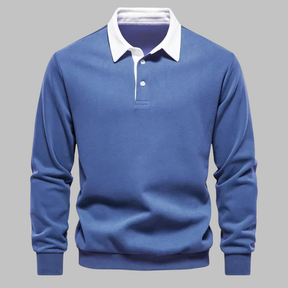 Blue sweater with white collar on a gray background
