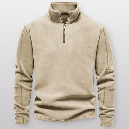 Beige fleece pullover with a zipper on a light gray background