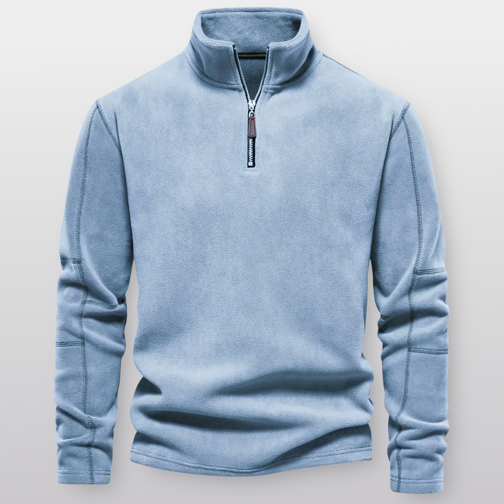 Light blue pullover with a zipper on a light gray background