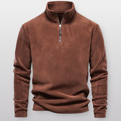 Brown fleece pullover with a zipper on a light gray background