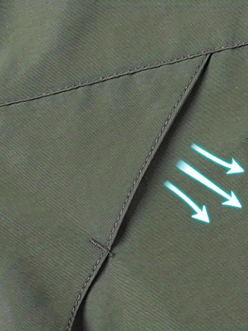 Close-up of green fabric with glowing arrows indicating airflow or ventilation.