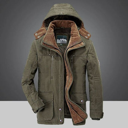 Green winter coat with brown lining on a gray background