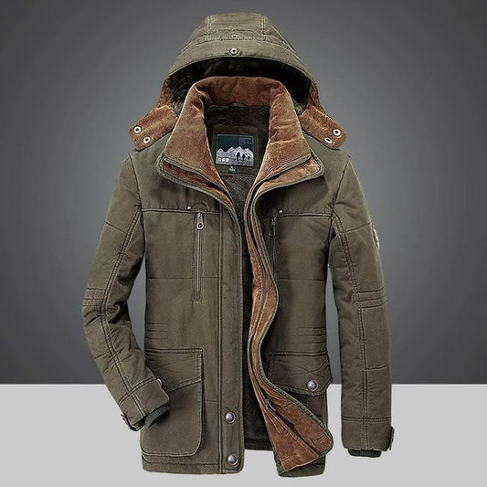 Green winter coat with brown lining on a gray background