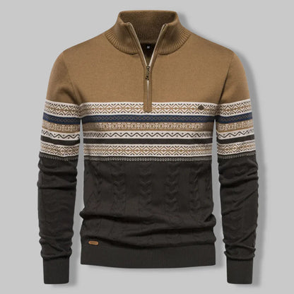 Brown and black sweater with patterned sleeves on a gray background