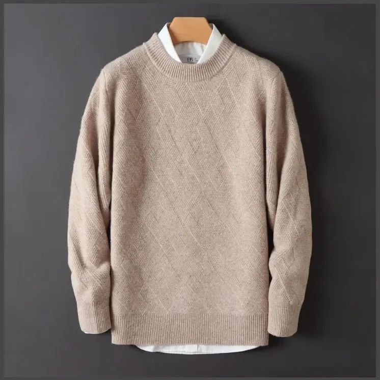 Beige sweater on a hanger against a dark background