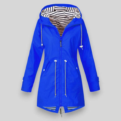 Blue raincoat with striped lining on a gray background