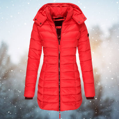 Red puffer coat on a snowy background