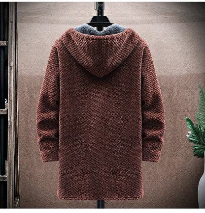 Brown sherpa fleece jacket on a mannequin against a neutral background