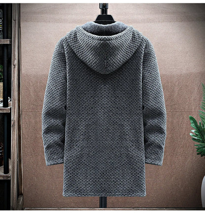 Gray knitted hoodie on a mannequin against a neutral background